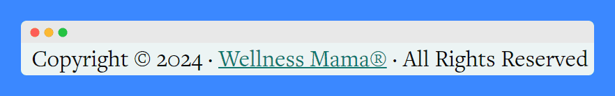 Wellness Mama's copyright notice with copyright symbol on a light green background.