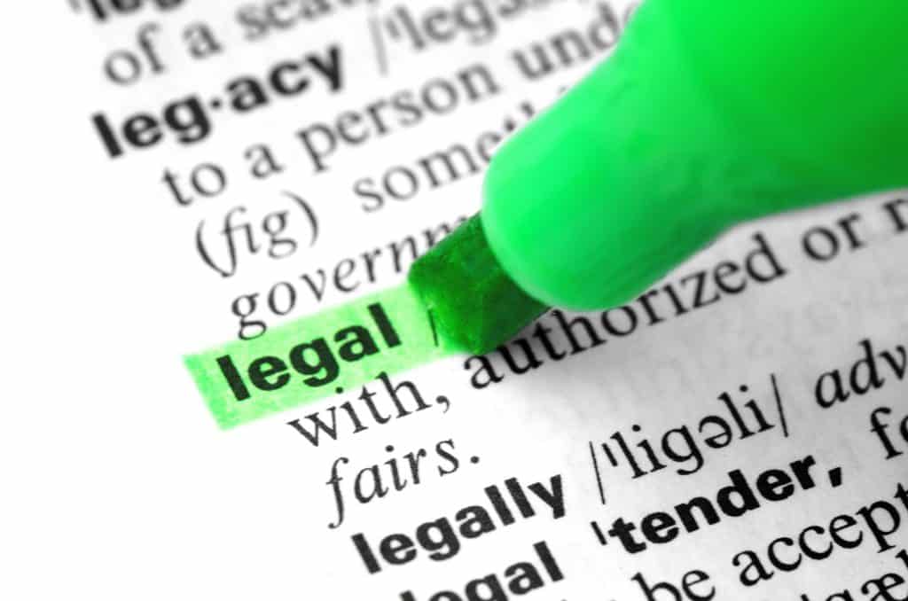 A green highlighter marking the word "legal" in a dictionary definition.